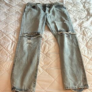 Brand new ripped knee Levi 501s. Tags on.